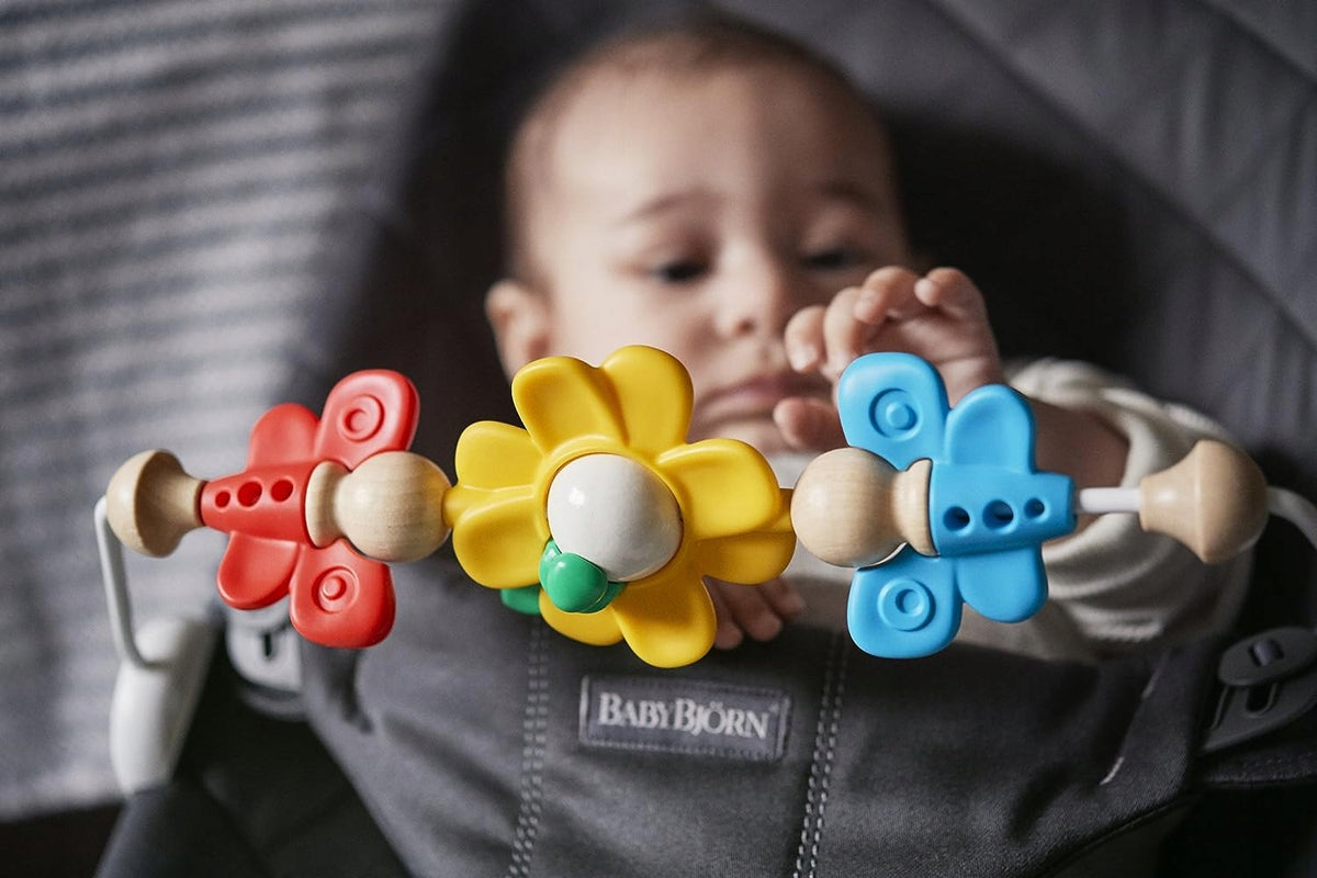 BabyBjorn Flying Friends colors: red, yellow, blue