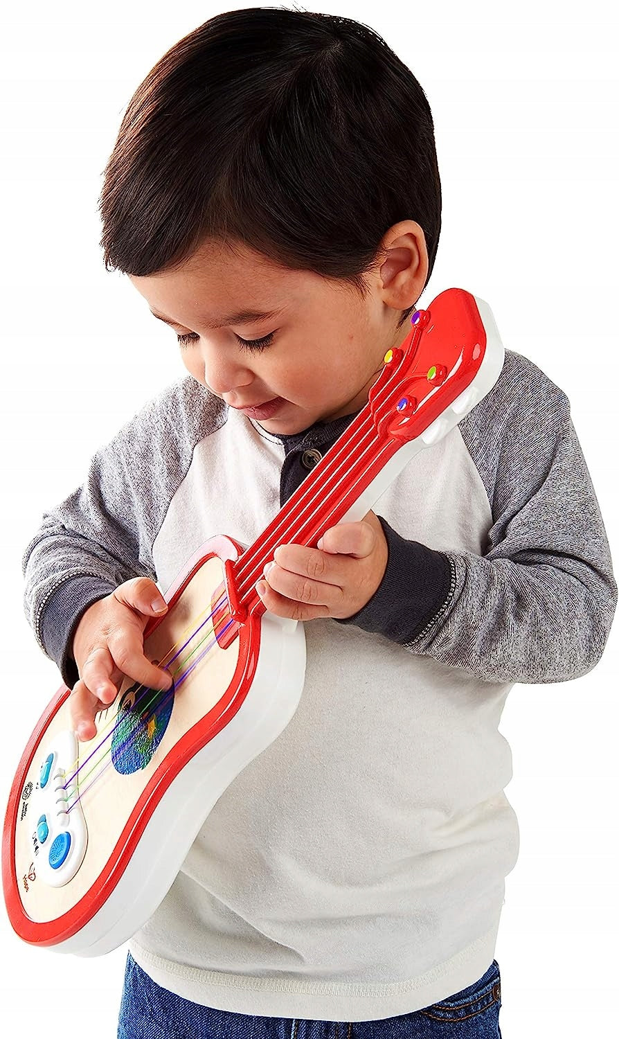 HAPE Baby Einstein ukulele 43 cm drewno, plastik, czerwone ukulele edukacyjne dla dziecka bawiącego się na białym tle