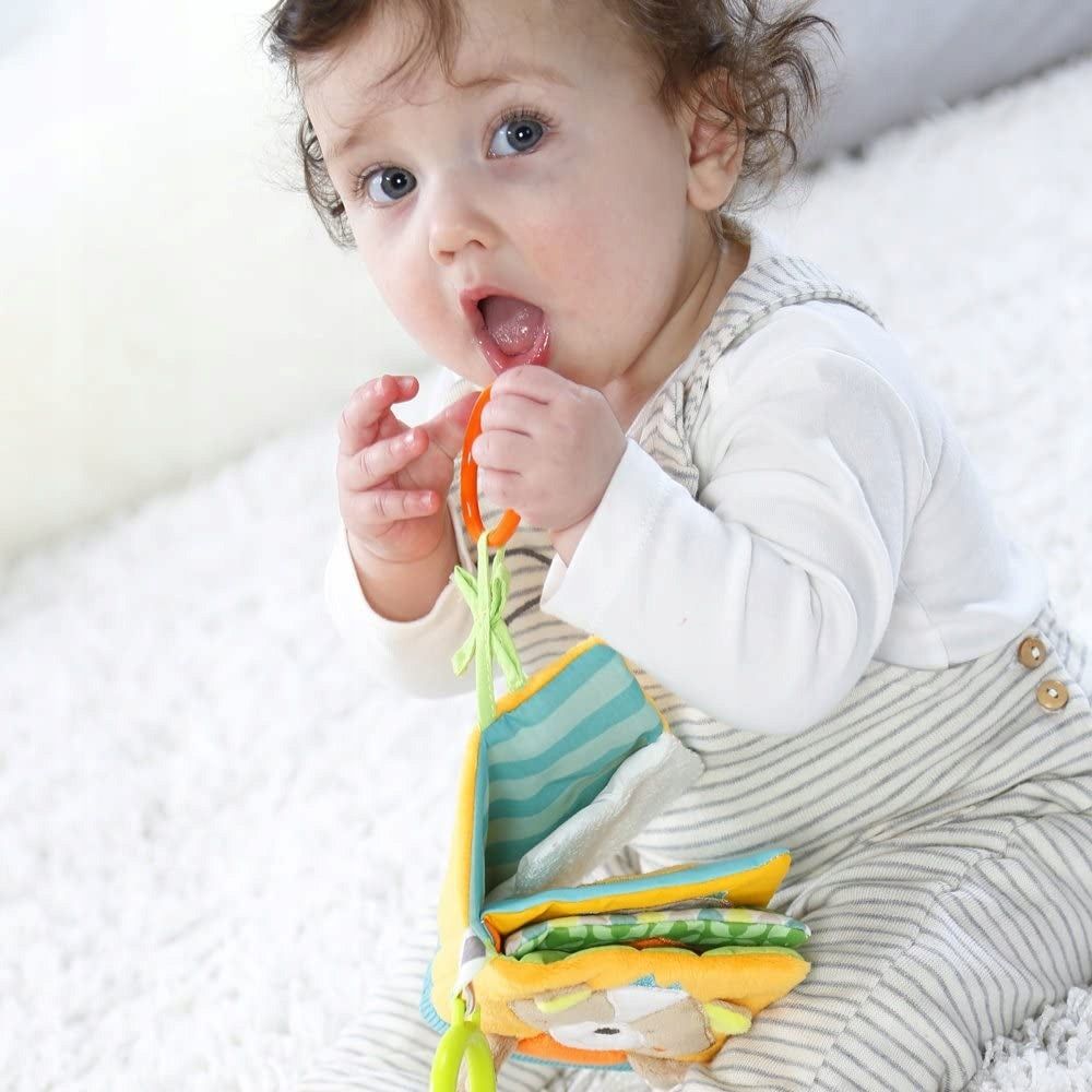 FEHN sensory book with a mirror, hanging toy