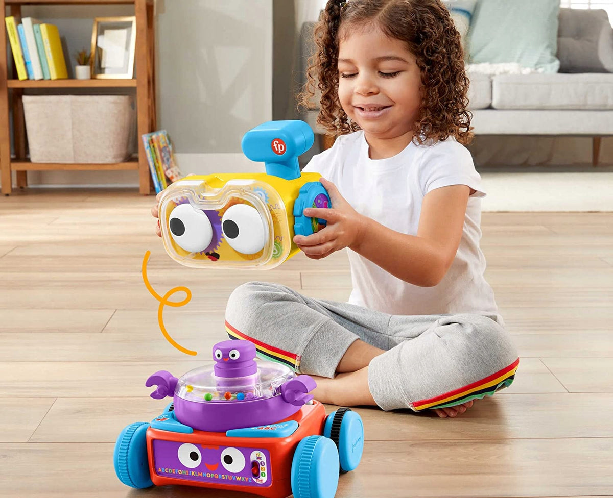 Dziecko bawiące się robotem Fisher-Price Linus