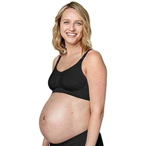 Kobieta w czarnym biustonoszu do karmienia Medela Keep Cool, widok z przodu pod kątem.
