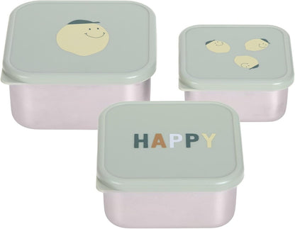 Trzy pojemniki z jasnymi pokrywkami, na których widać uśmiechnięte buźki i napis HAPPY.