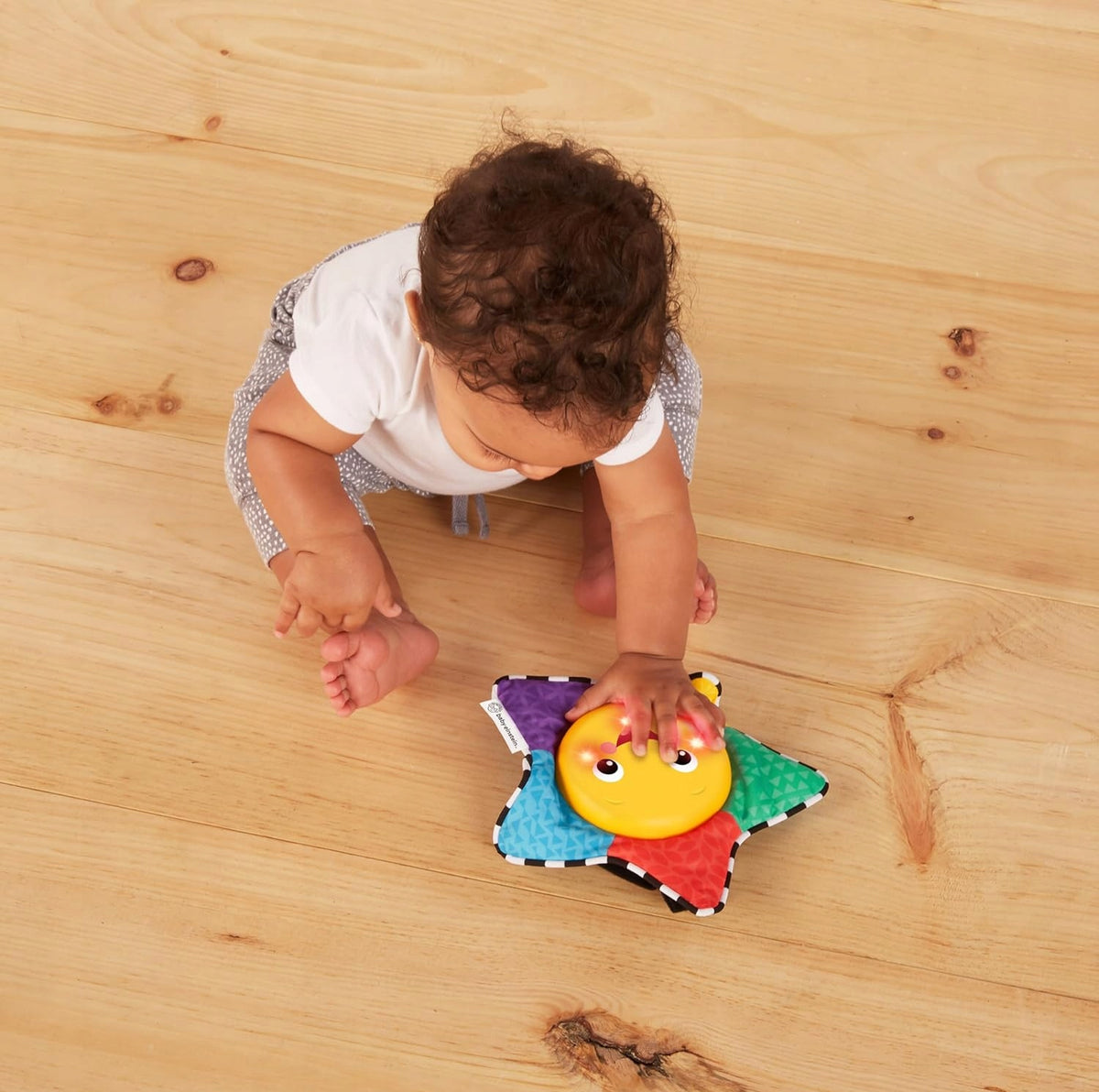 BABY EINSTEIN hudební hračka se světýlky HVĚZDA 19 cm