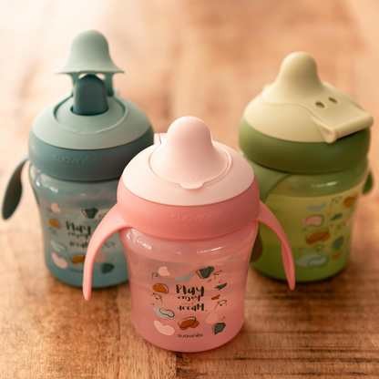 SUAVINEX Learning Cup hrnek nekapající s tvrdým náustkem 200 ml 6 m+